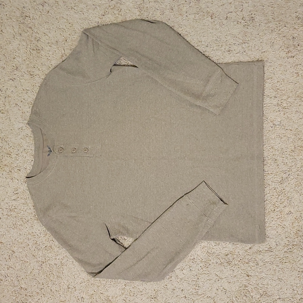 Medium, 3-button, tan, waffle knit, long- sleeved shirt.
